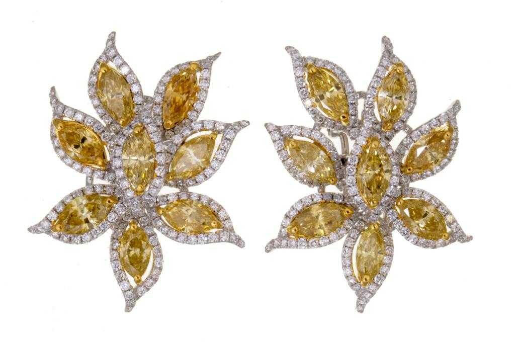 Appraisal: A PAIR OF DIAMOND AND MARQUISE YELLOW DIAMOND EARRINGS designed