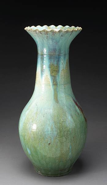 Appraisal: A large turquoise and red transmutation glazed pottery floor vase