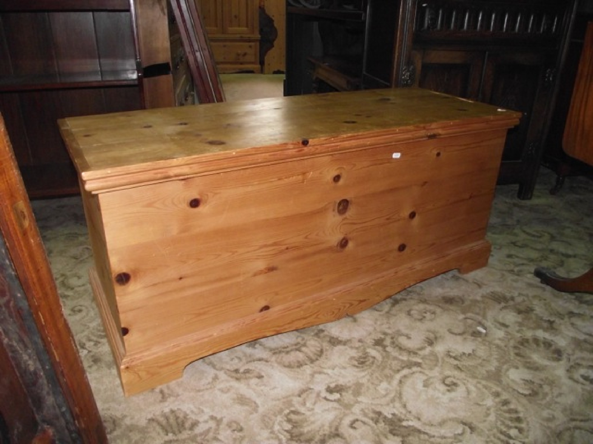 Appraisal: A stripped pine blanket box with hinged lid and moulded