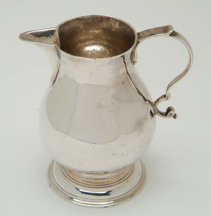 Appraisal: GEORGE II SILVER HANDLED CREAMER Edward Aldridge London Pear shaped