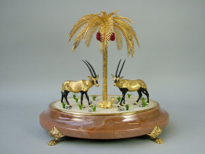 Appraisal: A pair of gilt and black painted oryx with calf