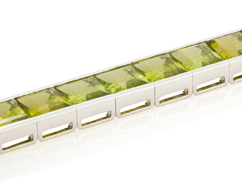 Appraisal: A PERIDOT LINE BRACELETA peridot line bracelet k white gold