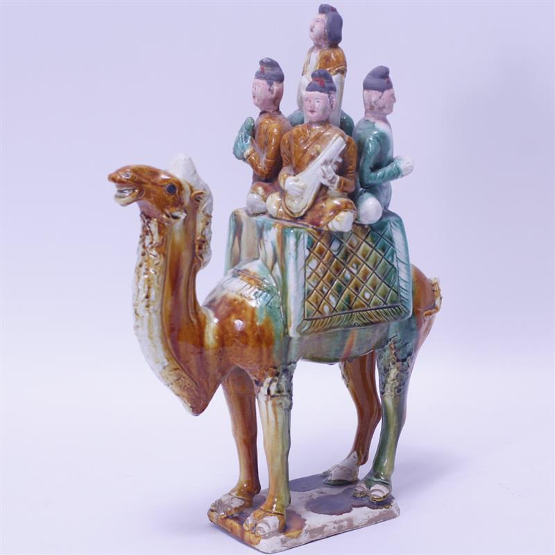 Appraisal: Chinese Glazed Roof Tile of a camel with five figures