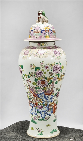 Appraisal: Chinese enameled porcelain covered vase famille rose floral motif lion