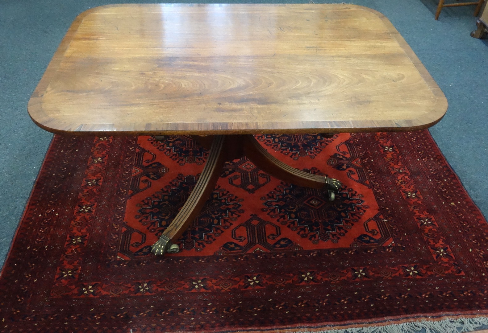 Appraisal: A Regency mahogany breakfast table the rectangular rosewood crossbanded boxwood