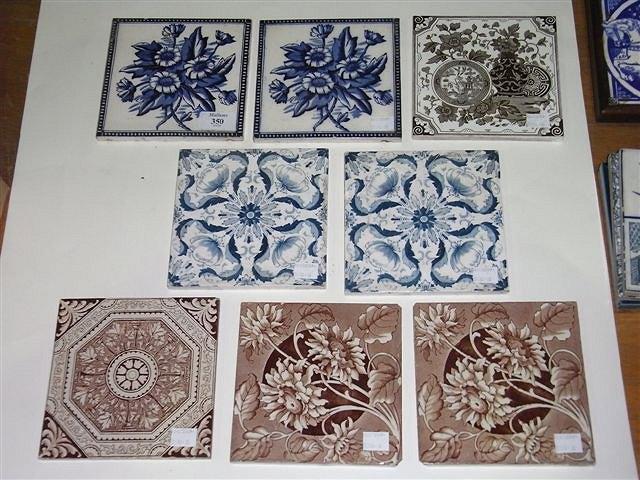 Appraisal: EIGHT MINTON AND OTHER TILES different pictures of flowers half