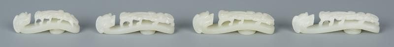 Appraisal: Chinese Dragon Jade Buckles Chinese carved celadon jade buckles all