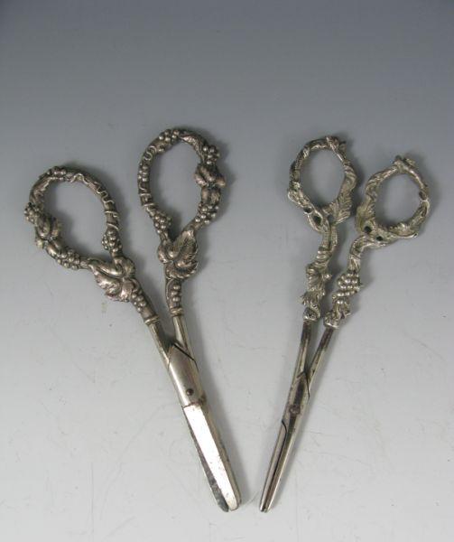 Appraisal: Two Victorian Silverplate Grape Shears each with finely cast grape