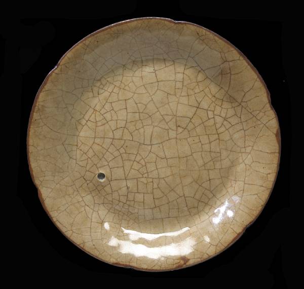 Appraisal: A crackle glazed porcelain floriform dish th Century Its flared