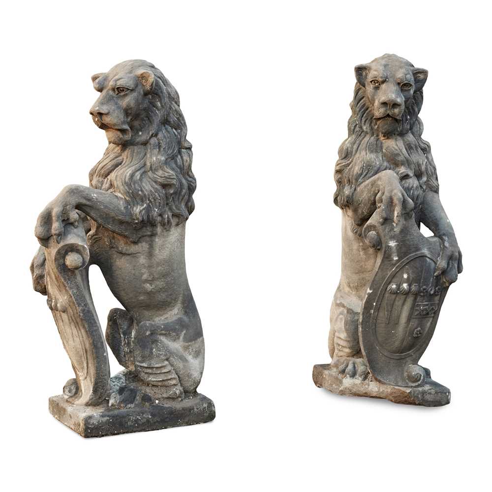 Appraisal: PAIR OF SCOTTISH CARVED STONE ARMORIAL LION GATE FINIALS TH