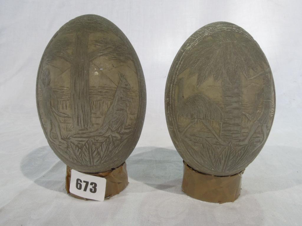 Appraisal: A pair of Australian emu eggs both carved one with