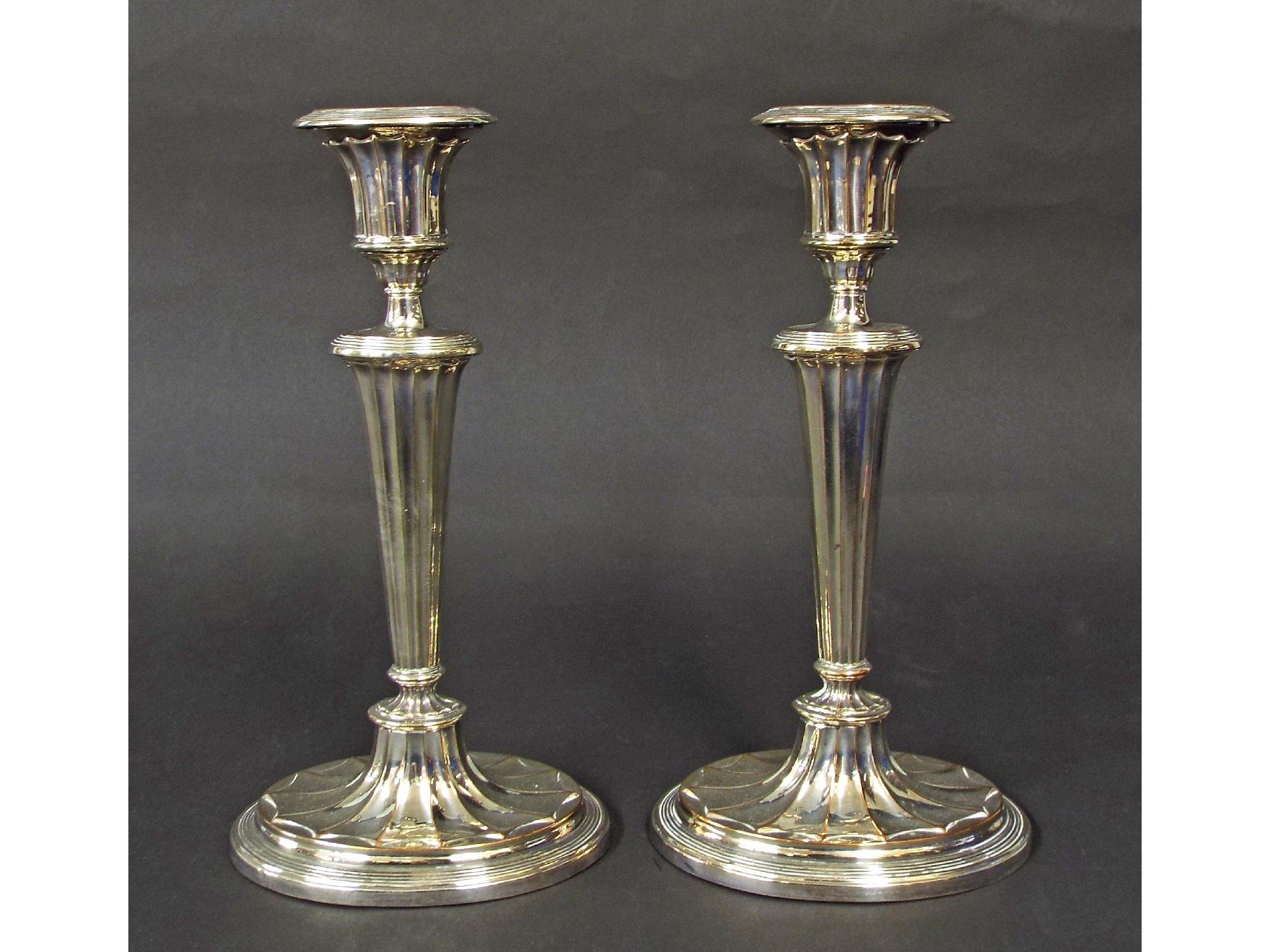 Appraisal: Pair of Sheffield plate faceted candlesticks high