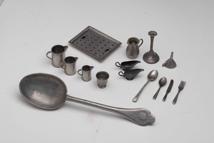 Appraisal: COLLECTION OF EUROPEN PEWTER MINIATURE TOY OBJECTS Including a candlestick