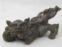 Appraisal: A well modelled Chinese bronze temple dog x x cm