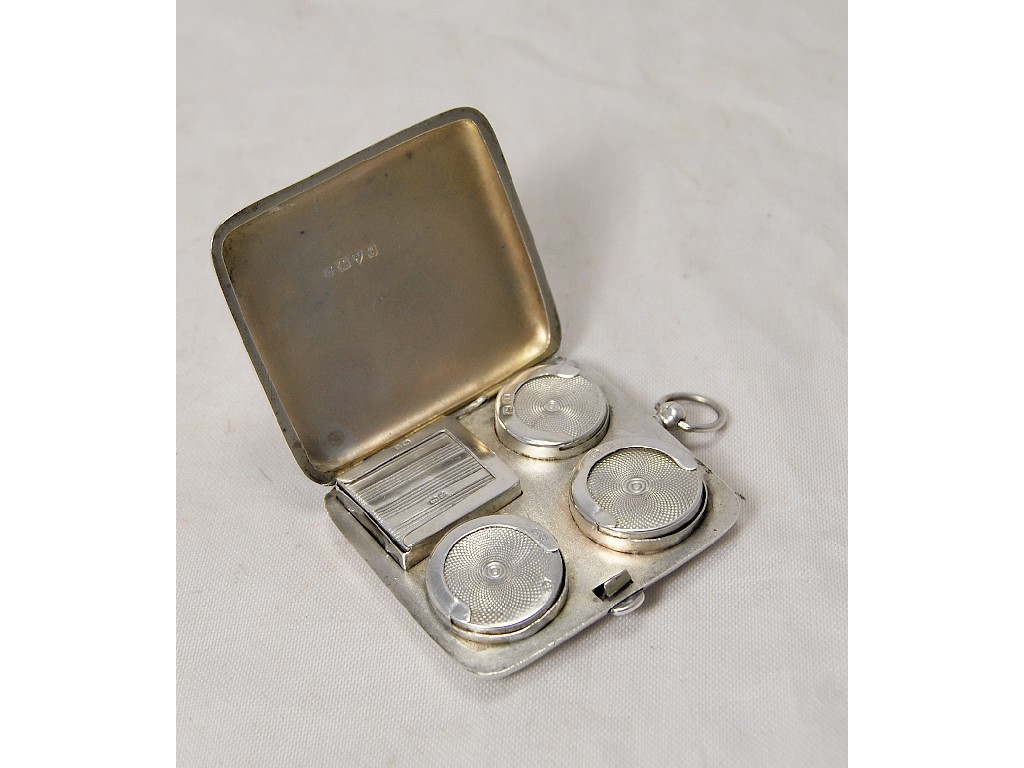 Appraisal: Rectangular silver hinged case with holders for sovereigns half-sovereigns and