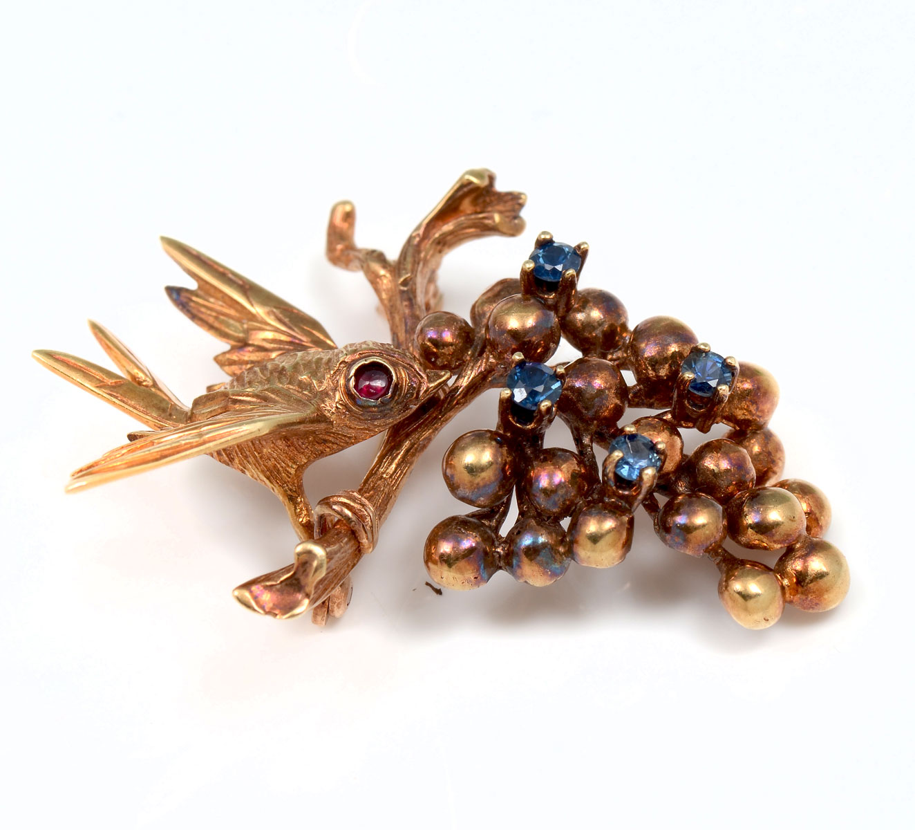 Appraisal: K BIRD BRANCH BROOCH K yellow gold stylized bird and