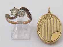 Appraisal: A hallmarked ct gold locket with engine turned decoration together