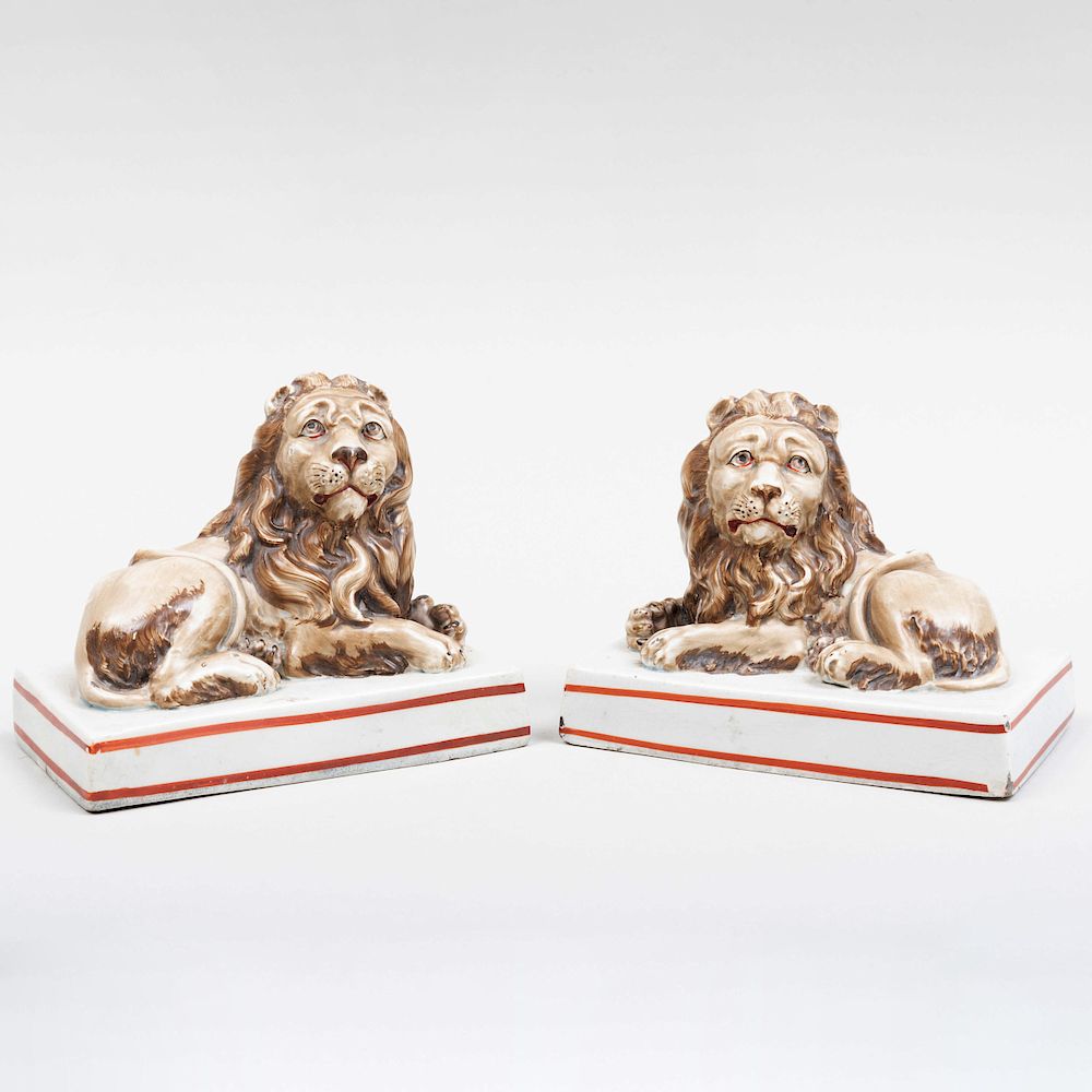 Appraisal: Pair of Wood Caldwell Staffordshire Pearlware Lions Impressed marks in