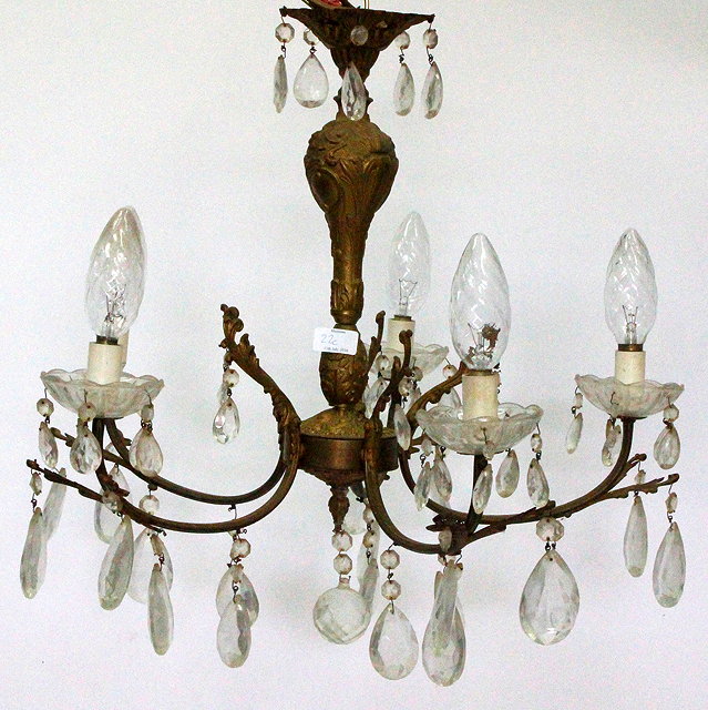 Appraisal: A BRASS FIVE BRANCH CEILING LIGHT with glass droppers