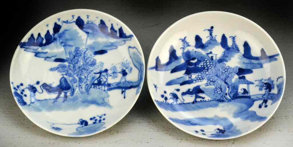 Appraisal: Pr Chinese Qing Blue White Porcelain SaucersFinely painted with traditional