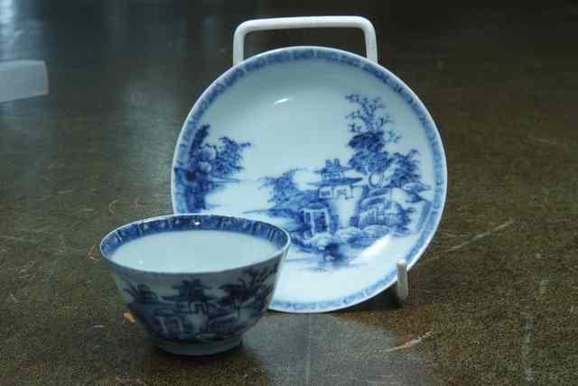 Appraisal: A PORCELAIN TEA BOWL AND SAUCER from the Nanking Cargo