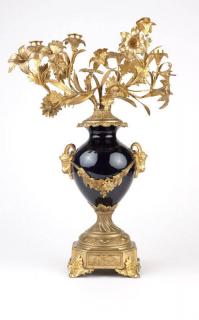 Appraisal: A French gilt bronze porcelain candelabrum Early th century modeled