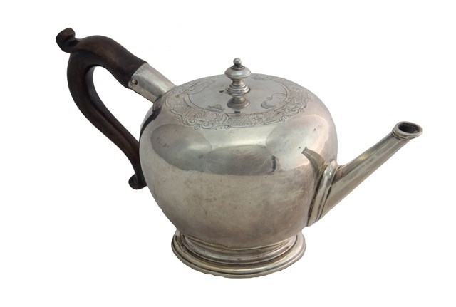 Appraisal: A George II silver bullet shaped teapot with engraved decoration