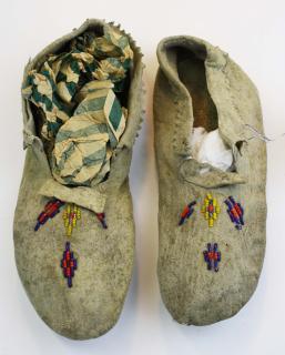 Appraisal: Plains Indian beaded moccasins length Plains Indian beaded moccasins length