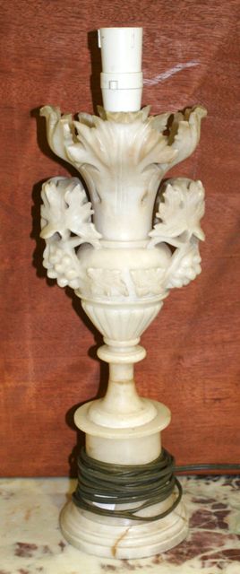 Appraisal: A pair of alabaster lamps in the form of urns