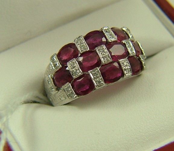 Appraisal: RUBY DIAMOND AND FOURTEEN KARAT WHITE GOLD RING set with