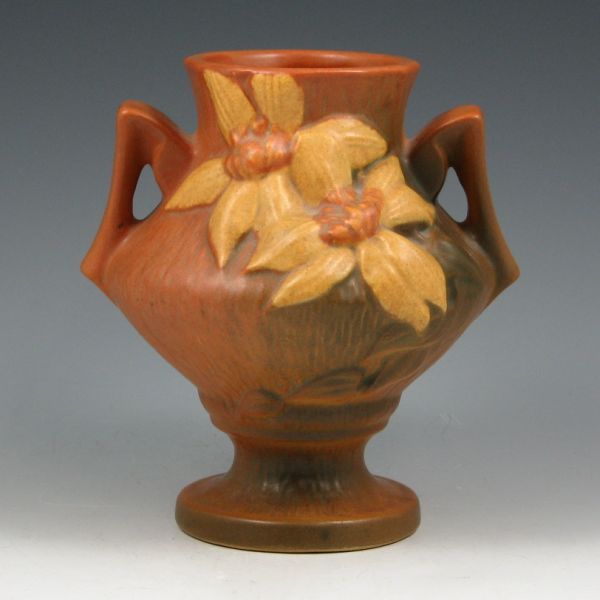 Appraisal: Roseville Clematis handled vase in brown Marked Roseville USA -