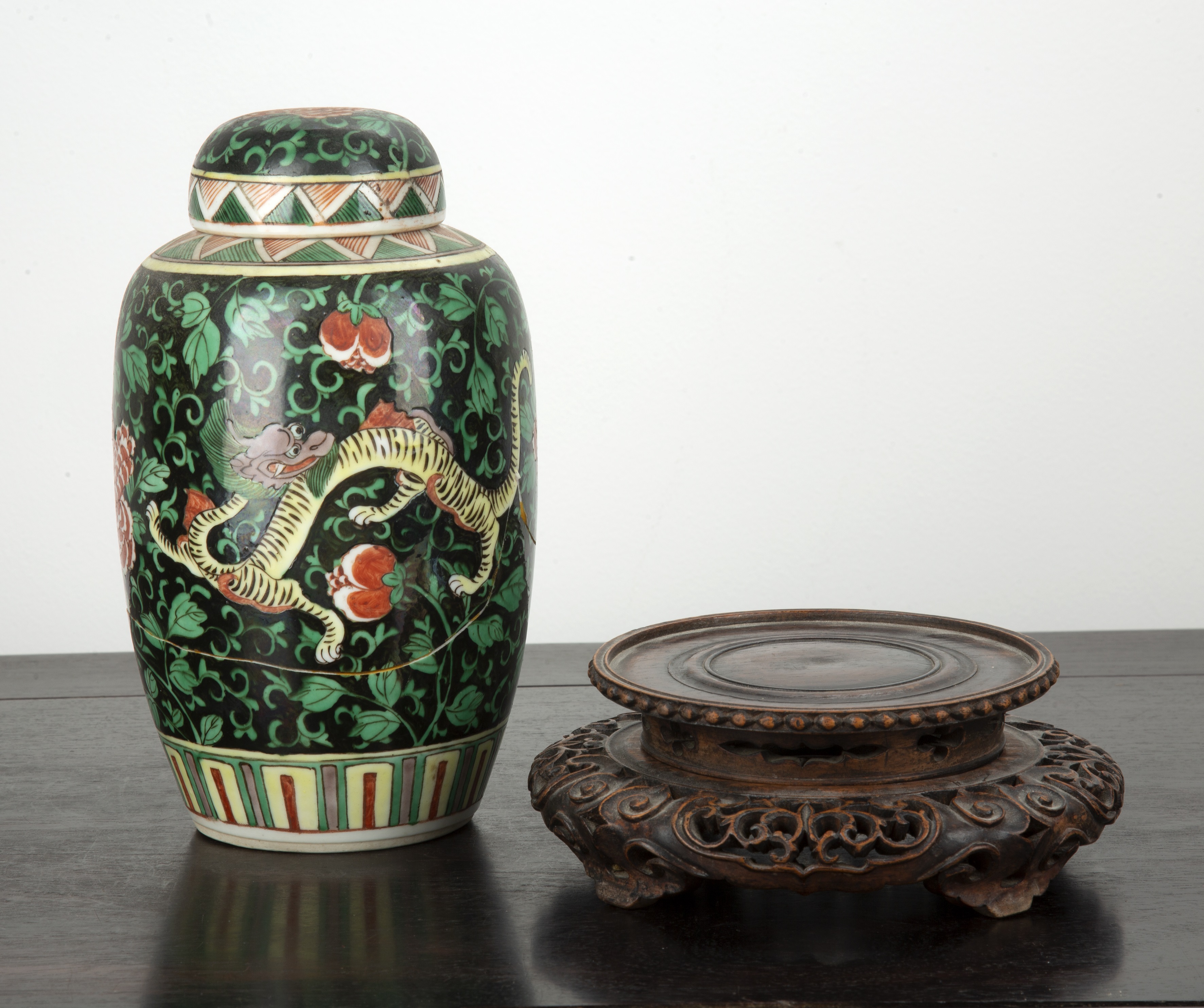 Appraisal: Green ground jar and coverChinese th Century with a painted