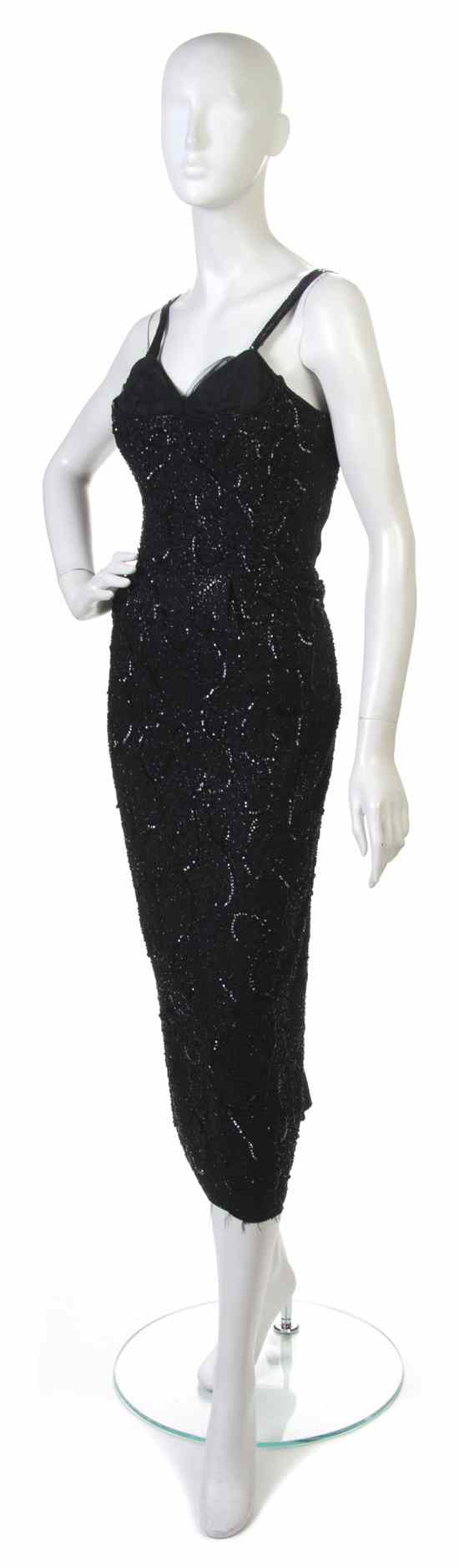 Appraisal: A Ceil Chapman Black Beaded Sheath Evening Dress Labeled Ceil