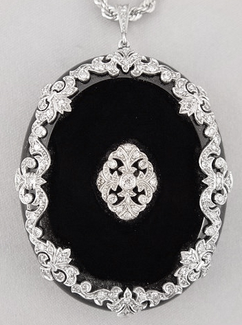 Appraisal: EDWARDIAN K PLATINUM ENAMEL CTW DIAMOND LOCKET PENDANT Oval shaped