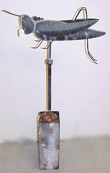 Appraisal: Grasshopper weathervane copper on wood block stand overall height length