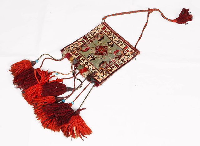 Appraisal: A QASHQ'AI SALT BAG with a central hooked medallion on