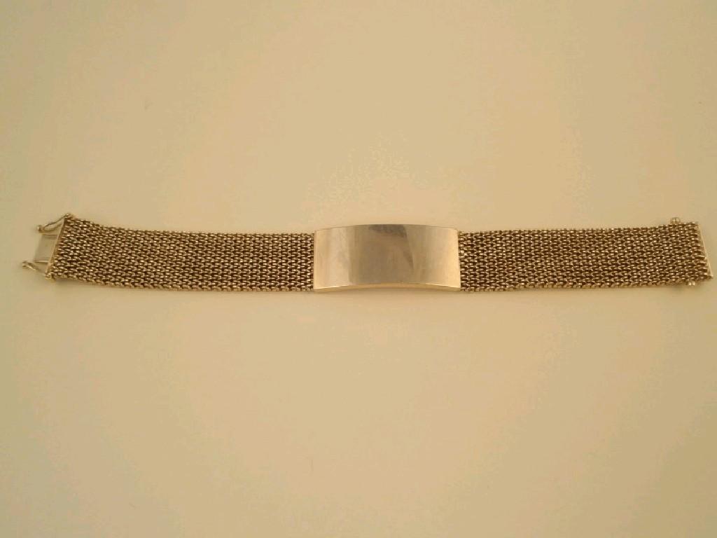 Appraisal: A heavy mesh link and solid bar bracelet with tongue