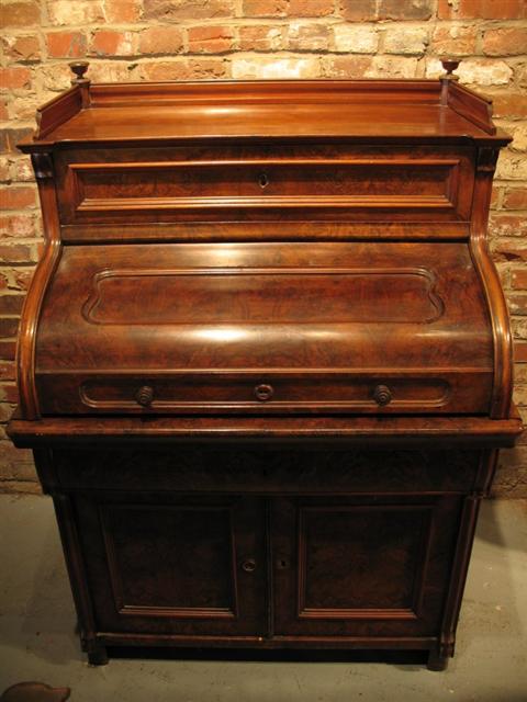 Appraisal: CONTINENTAL WALNUT ROLL TOP DESK th century probably German the