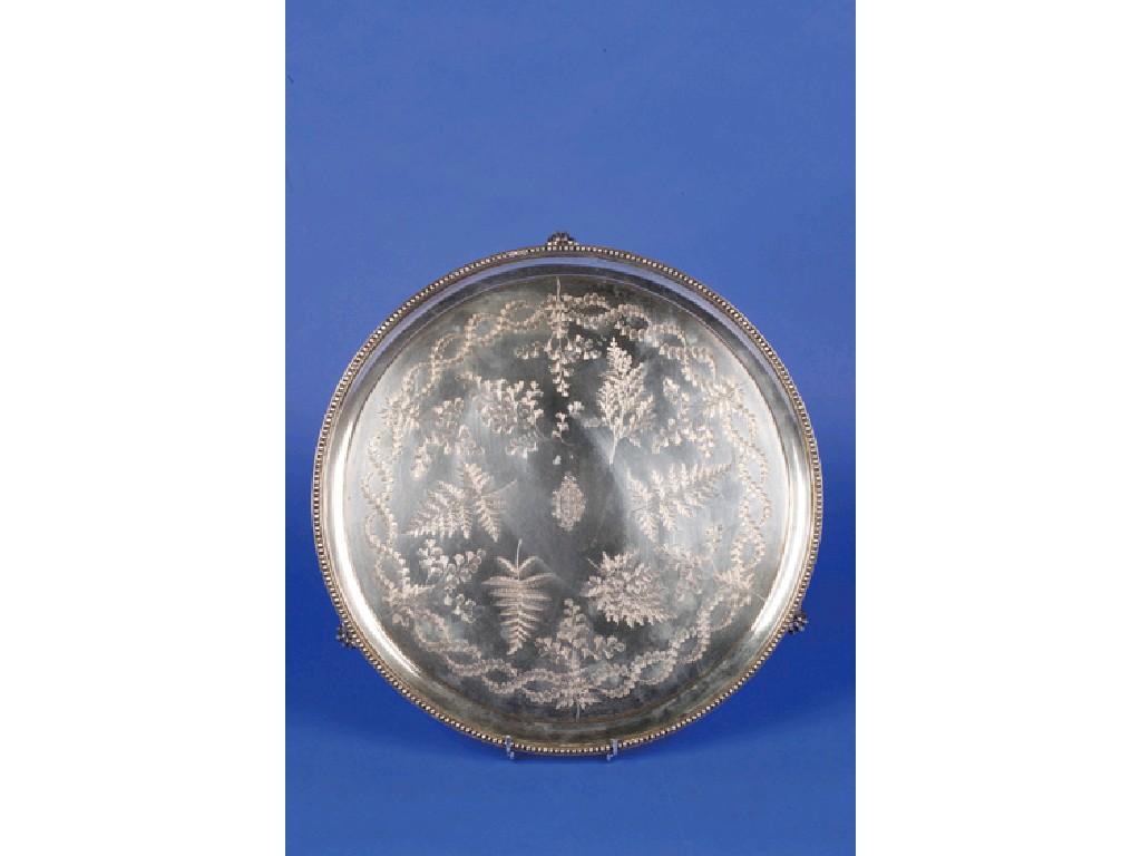 Appraisal: A VICTORIAN SALVER of circular form with a beaded border