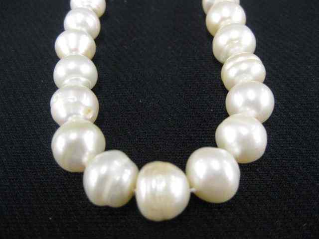 Appraisal: Pearl Necklace opera length to mm fresh water cultured baroque