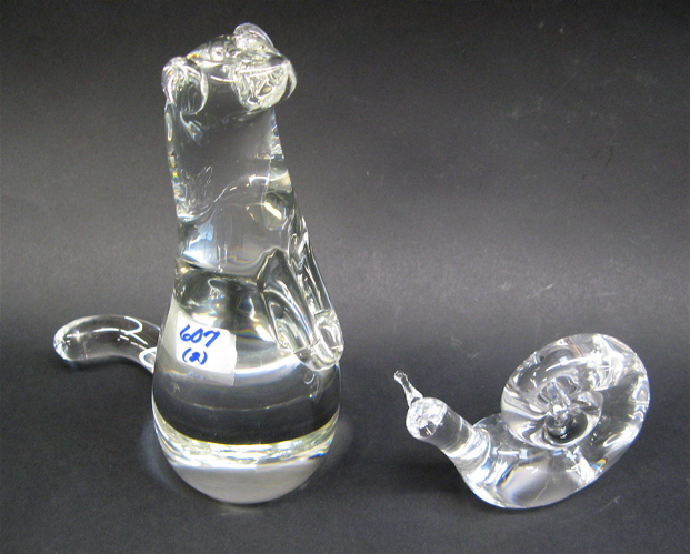 Appraisal: TWO STEUBEN CRYSTAL FIGURINES a mink standing tail outstretched height