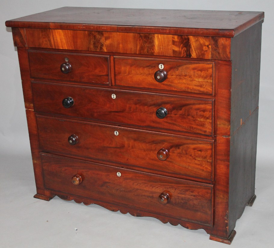 Appraisal: A thC flame mahogany chest of two short and three