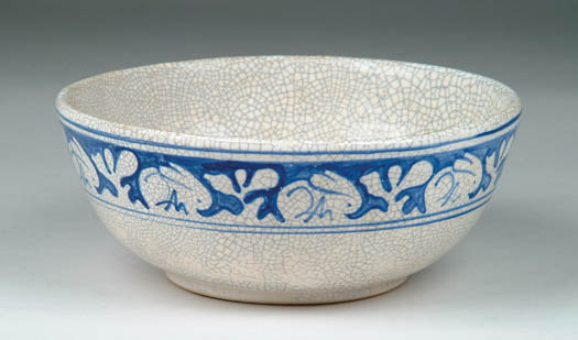 Appraisal: DEDHAM POTTERY FOOTED BOWL WITH RABBIT DECORATION Blue and white