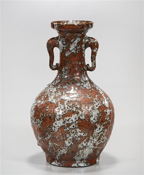 Appraisal: Chinese glazed ceramic vase iron rust and white handles to