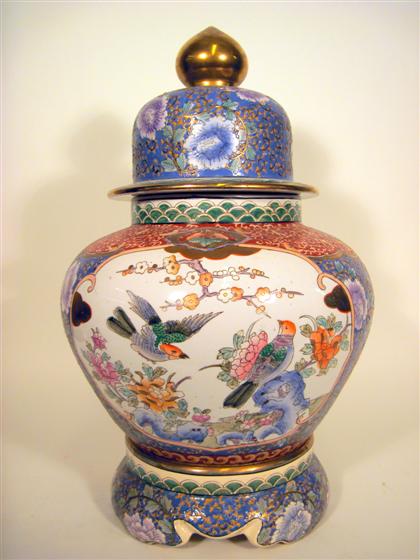 Appraisal: Chinese polychrome decorated porcelain covered vaseOf baluster form with domed