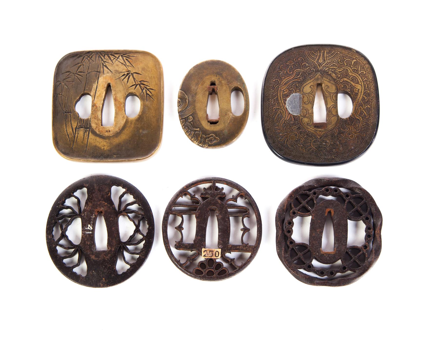 Appraisal: SIX JAPANESE TSUBA Probably th- th century Three brass with