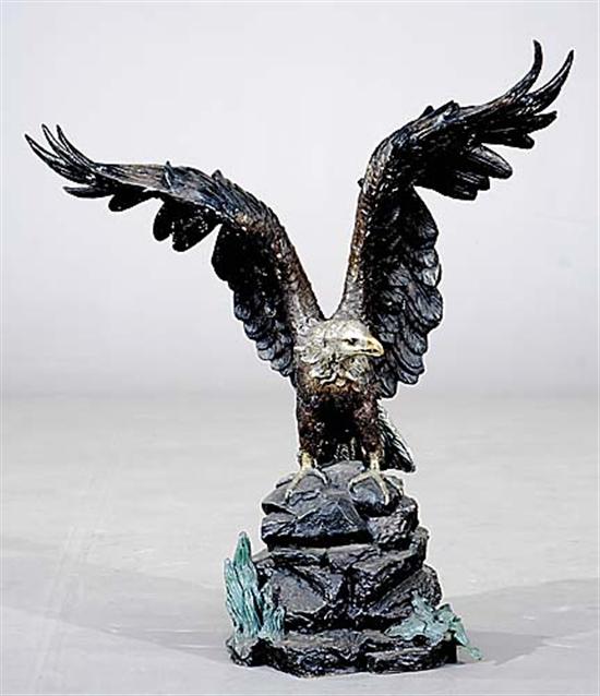 Appraisal: Continental school th century HUNTING EAGLEbronze with silver gold and