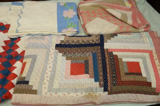 Appraisal: Four hand stitched quilts Four hand stitched quilts