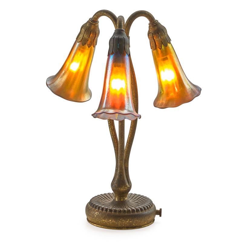 Appraisal: TIFFANY STUDIOS Three-light lily lamp Condition Report Shades probably assembled