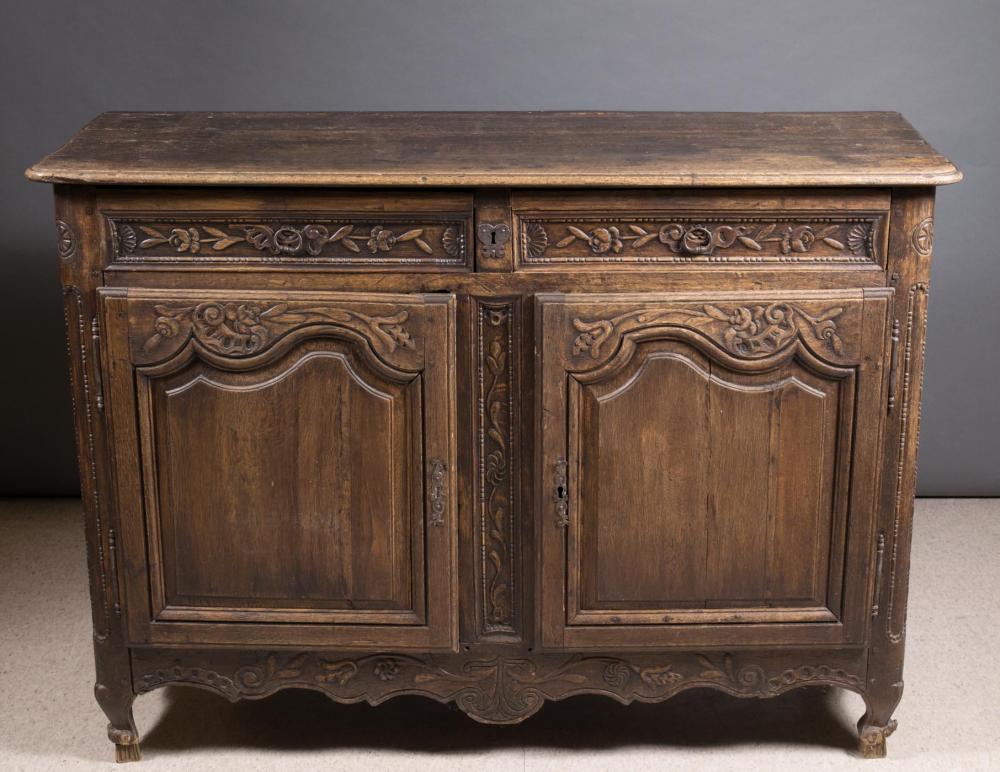 Appraisal: PROVINCIAL CARVED OAK BUFFET French th century H x W